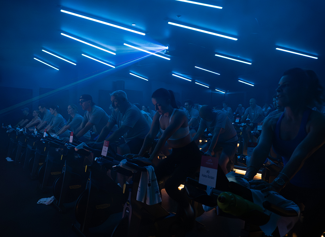 Group spin class blue lights